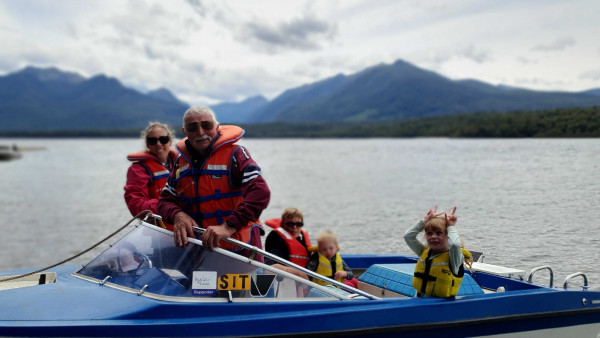 Boyd and family on a boat