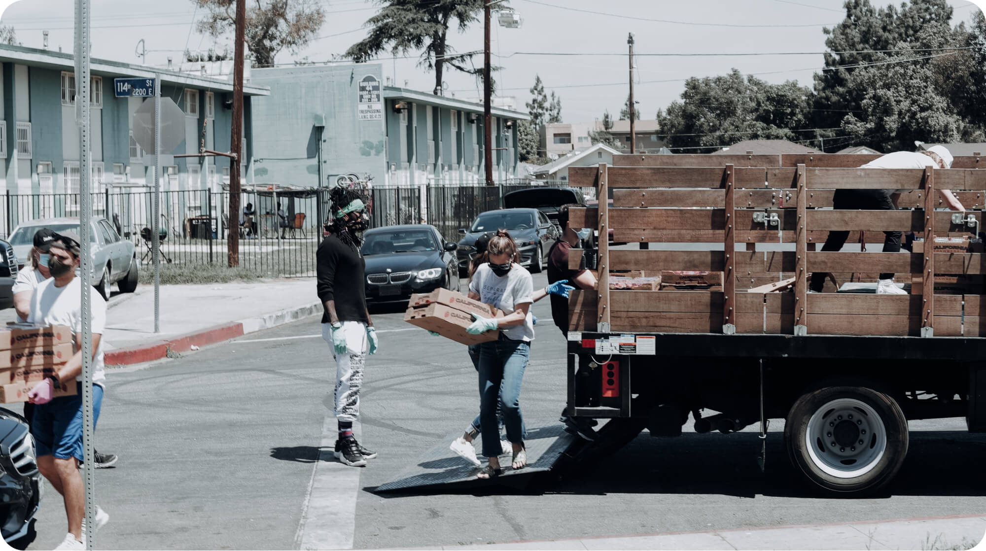 Volunteers unloading a truck for charity